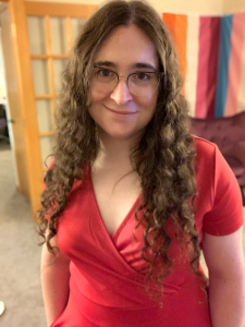 Image of Dr. Michael Ann DeVito in a red dress